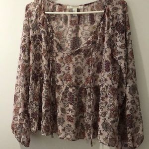 A sheer floral blouse